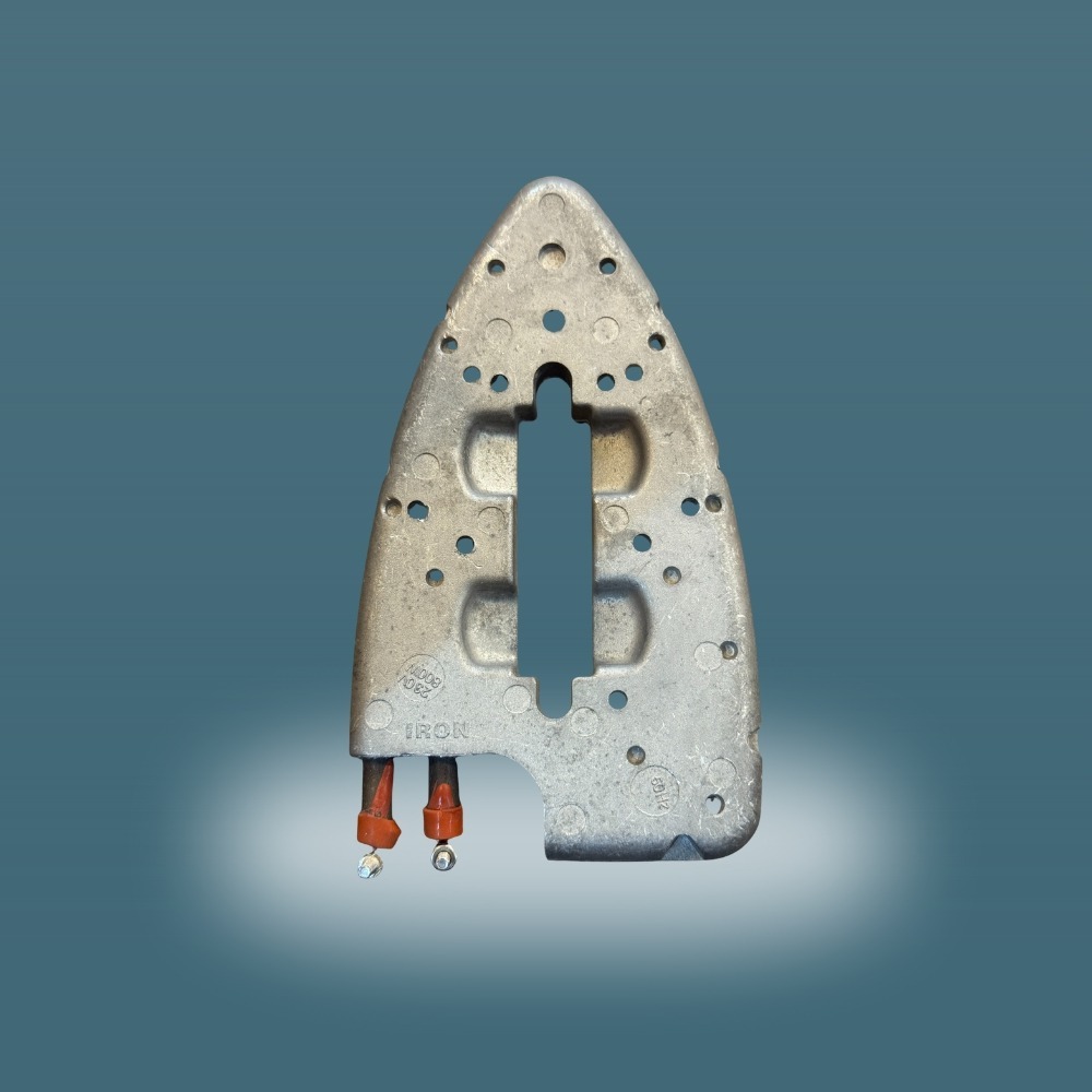 Italian steam iron heater for laundry equipment with high performance heating element